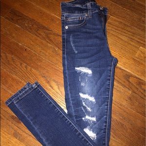 Mid / high rise ripped skinny jean